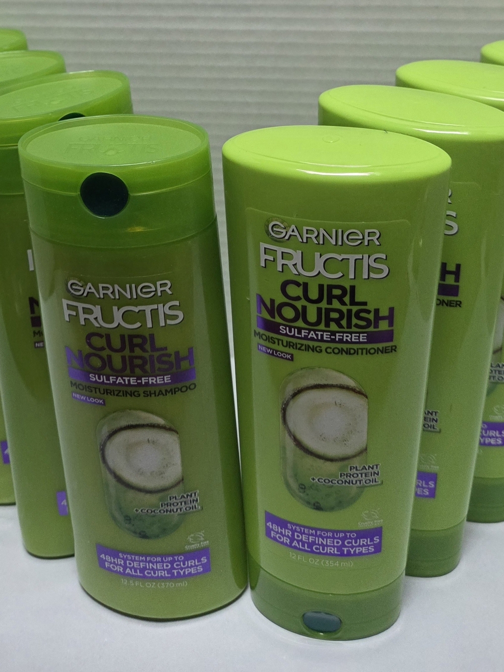 10 Garnier Fructis Curl Nourish Sulfate-Free Conditioner & shampoo— Green